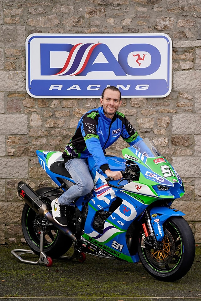 Braydon Elliott on a motorbike smiling